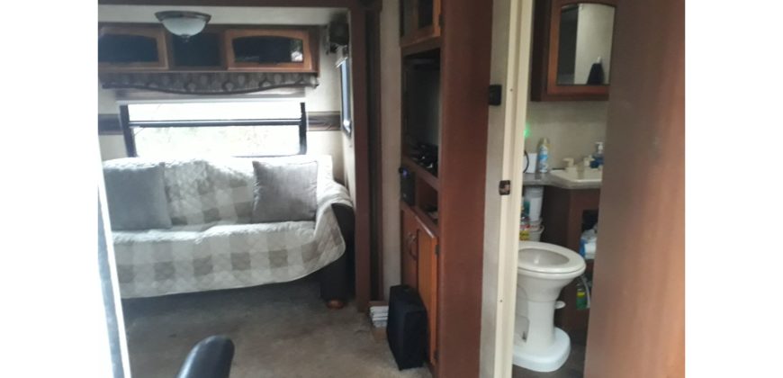 21015  2014 RV Trailer with ADA Ramp.