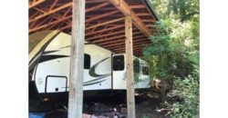 20013  Beautiful 33 foot Sundance RV Year-Round Access