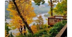 10052  Gorgeous lake, mountain, and forest views from wrap-a-round decks