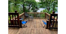 10052  Gorgeous lake, mountain, and forest views from wrap-a-round decks