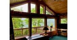 10052  Gorgeous lake, mountain, and forest views from wrap-a-round decks