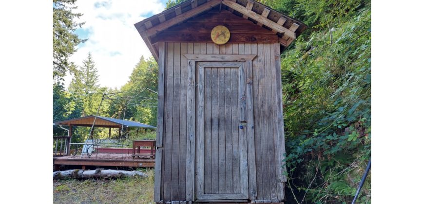 19031  Large Black Tank, Bare Site w/deck and shed