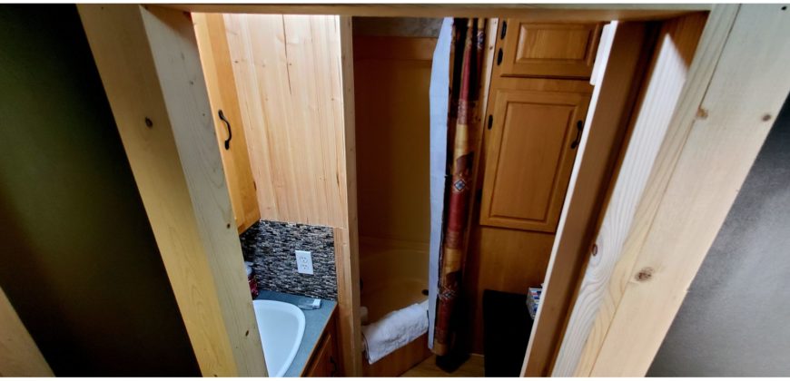 05117  Large Site Backing to Greenspace…Cabin-Feel Inside RV