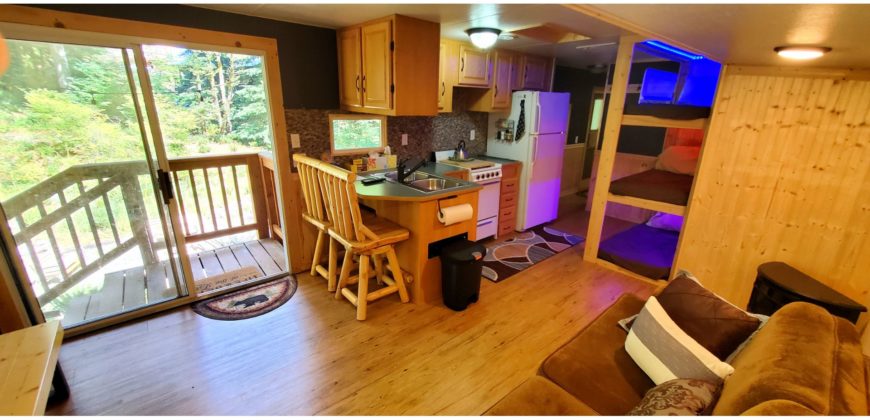 05117  Large Site Backing to Greenspace…Cabin-Feel Inside RV