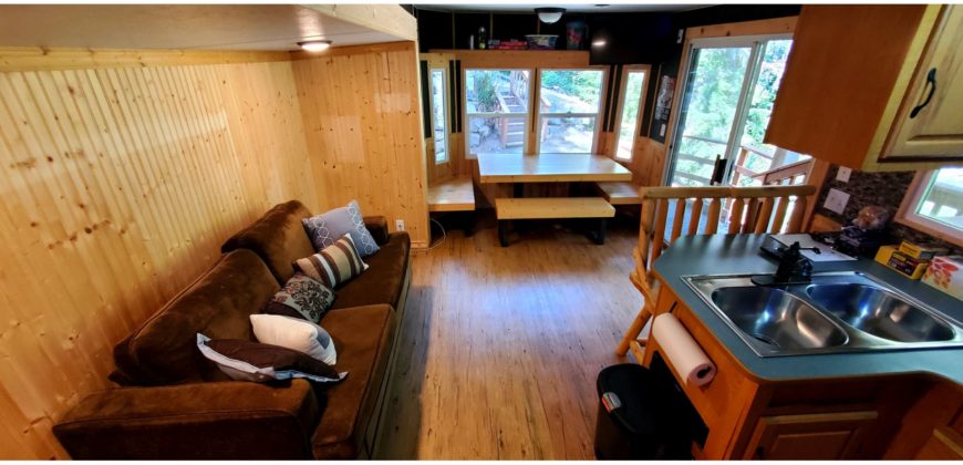 05117  Large Site Backing to Greenspace…Cabin-Feel Inside RV