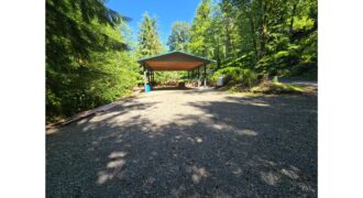 12084  Large RV Cover, Shed on Level, Graveled, Site.