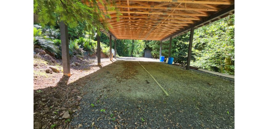 12084  Large RV Cover, Shed on Level, Graveled, Site.